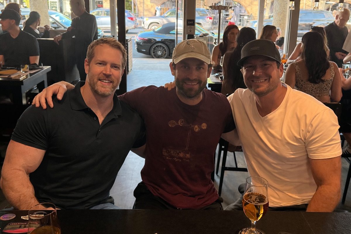 Bulldog Dads hanging out at a local restaurant
