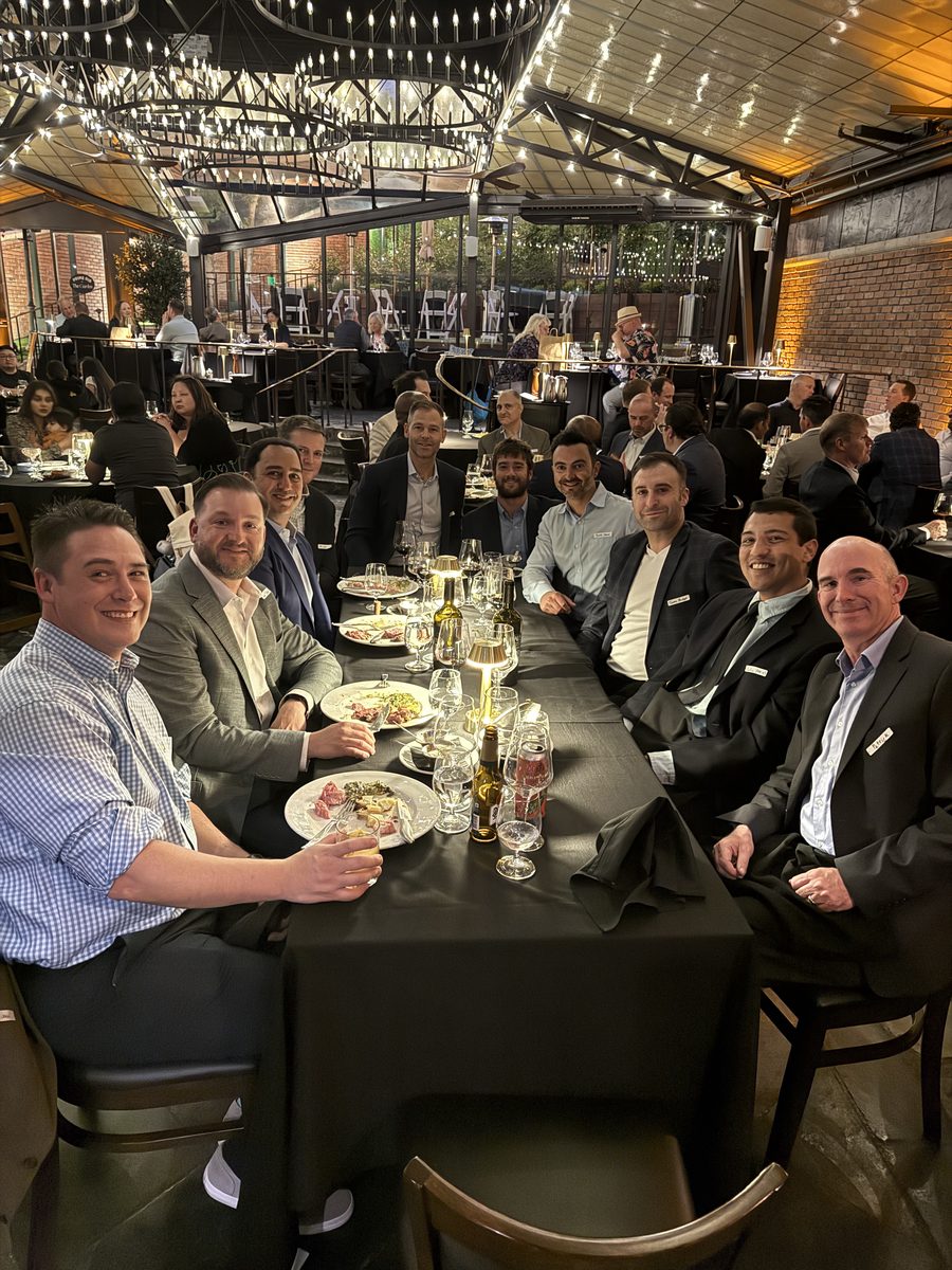 Large group of dads at The League dinner event