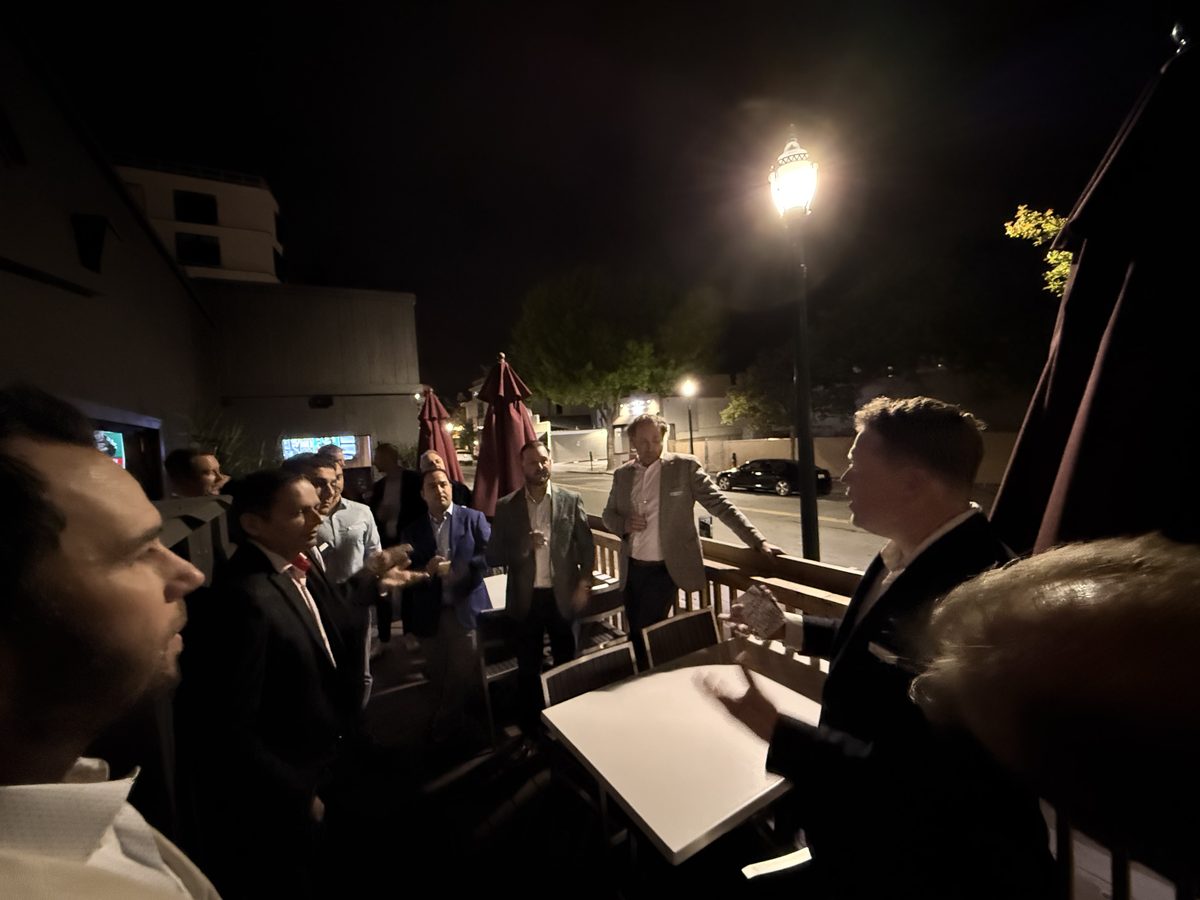Nighttime at the campsite with kids around the fire