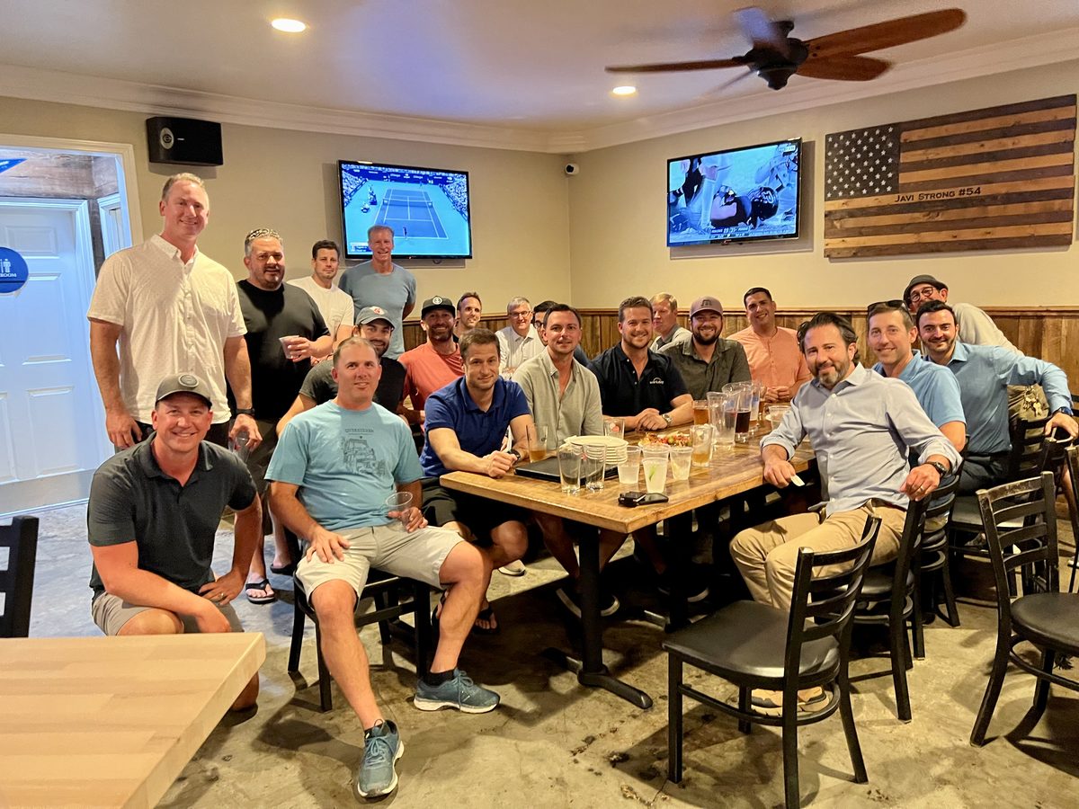 Bulldog Dads dinner at a long table