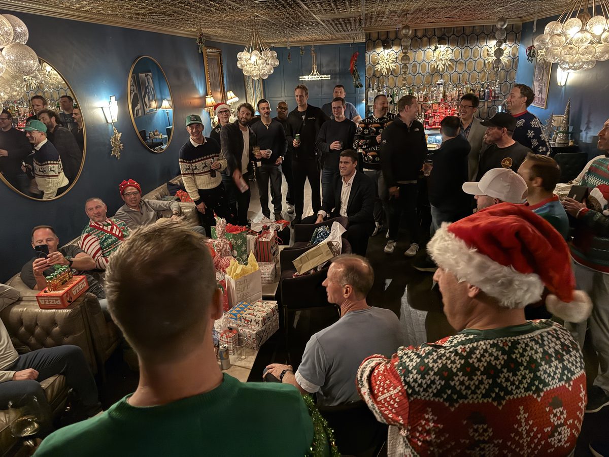 Bulldog Dads holiday party with Santa hats