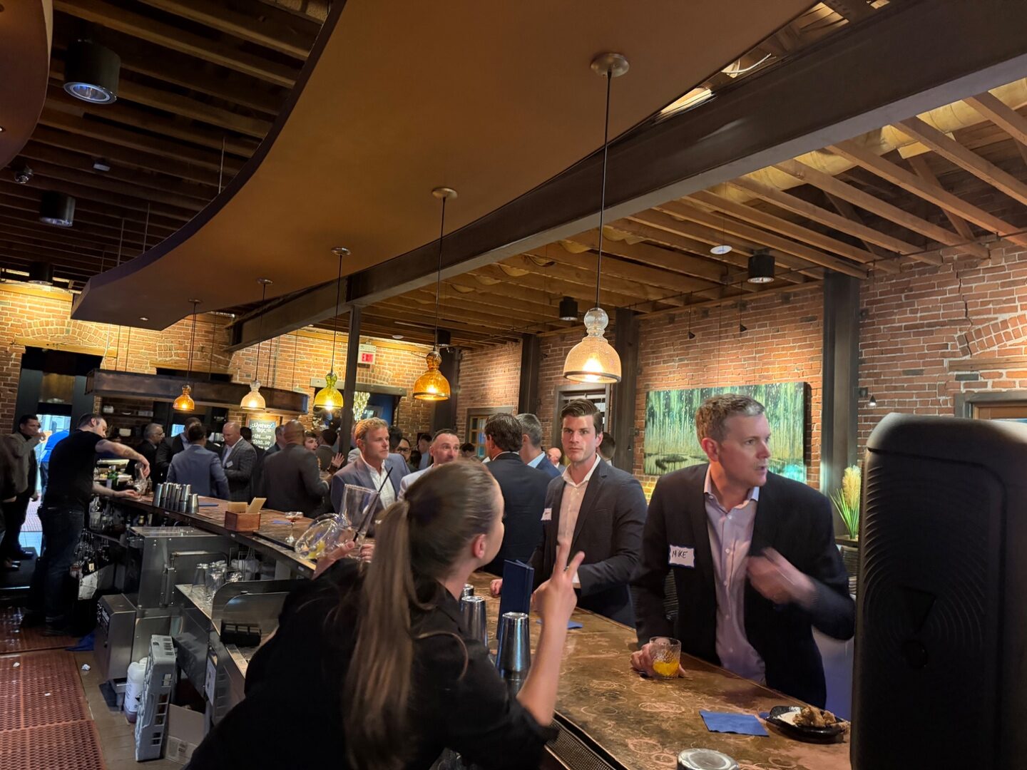 Dads mingling at the Sasa bar during TLEg 2 happy hour
