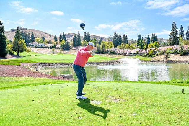 Tee shot over the pond at Blackhawk, 2026 SIS Golf Classic